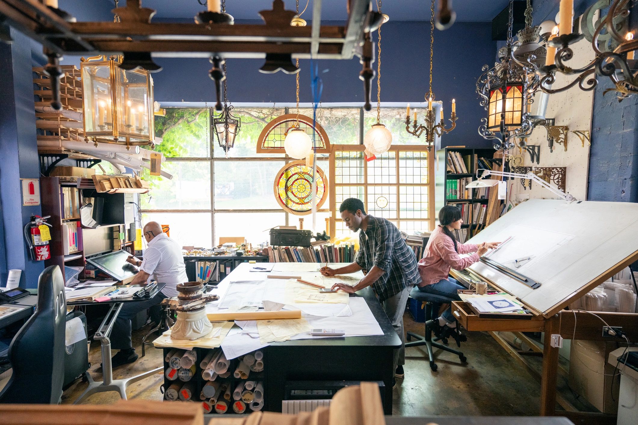 Creative team collaborating in a production studio