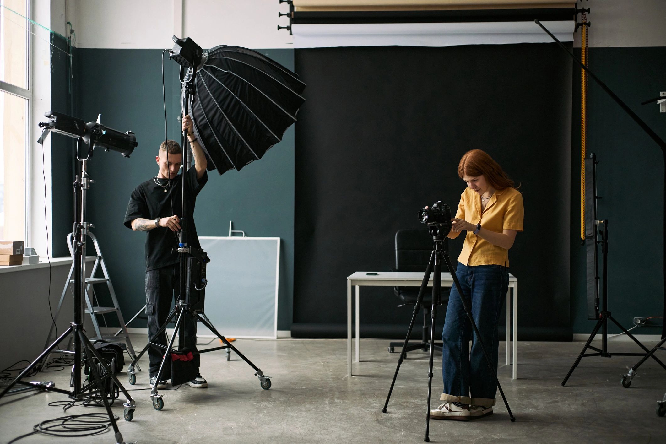Creative team preparing a studio production set